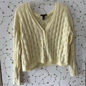 Pastel yellow knitted cardigan
